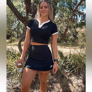 MUSCLE NATION Clubhouse Skort in Black